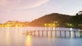 Wooden walkway leading to sea port night view Royalty Free Stock Photo