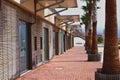 Wooden walkway of a modern touristy port in italy