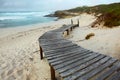 Wooden walkway onto beach Royalty Free Stock Photo