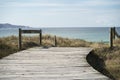 Wooden walkway over a dune zone