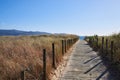 Wooden walkway over natural dunes in Vao beach, Vigo Royalty Free Stock Photo