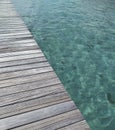 Wooden walkway over transparent and turquoise waters. Caribbean landscape Royalty Free Stock Photo