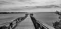 Wooden walkway pier to the water. Royalty Free Stock Photo