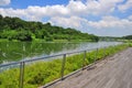 A wooden walkway by the river at Punggol Waterway Royalty Free Stock Photo