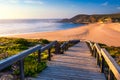 Wooden walkway to the beach Praia da Amoreira, District Aljezur, Algarve Portugal. Panorama from Amoreira beach in the Algarve Royalty Free Stock Photo