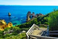 Wooden walkway to beautiful beach Praia do Camilo, Portugal Royalty Free Stock Photo