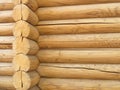 Corner of blockhouse closup. Brown rustic wooden texture background. Facade of a log house, copy space