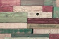 Wooden wall from of horizontal colored painted planks in different colors, surface texture, multicolored colorful