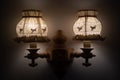 Wooden wall lamp with two country style lampshades