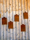 Wooden wall with metal plate Royalty Free Stock Photo