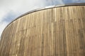 Wooden wall of modern building. Details of building. Construction of boards