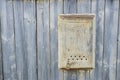 wooden wall and old iron mailbox copy space Royalty Free Stock Photo