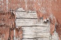 Wooden wall with peeling paint. Paint peeling plaster walls. Old Royalty Free Stock Photo
