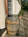 Wooden water barrel, gutter. Royalty Free Stock Photo