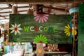 Wooden welcome sign board in tropical cafe Royalty Free Stock Photo