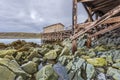 Wooden wharf constructions of the at abandoned fishersÃ¢â¬â¢ village Hamningberg at the stone coast of the Barents Sea. Finnmark, Royalty Free Stock Photo