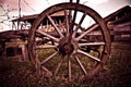 A wooden wheel from an old carriage Royalty Free Stock Photo