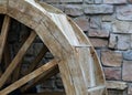 Wooden wheel of an old water mill. Royalty Free Stock Photo