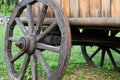 Wooden wheel of vintage cart close up