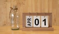 Wooden white brick calendar with the engraved date \