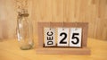 Wooden white bricks calendar with the engraved date \