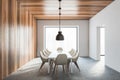 Wooden and white small meeting room with white chairs, table and big window