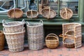 Wooden wicker baskets for sale in a street market fair. The concept of traditional culture