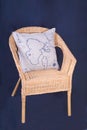 Wooden wicker chair with cushion