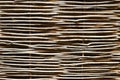 Wooden wicker fence hand braided in the village or interior design detail. Royalty Free Stock Photo