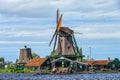 A wooden wind powered sawmill, Zaanse Schans a village near Zaandijk in the municipality of Zaanstad, North Holland Royalty Free Stock Photo