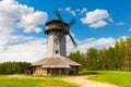 Wooden windmill on background sky with clouds. Naroch lake, Myadel Region, Belarus