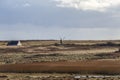 Wooden windmill in a deserted field, old windmill in authentic landscape of island of the Ouessant, Brittany, Finistere, France