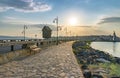 The wooden windmill on the isthmus at sunrise in Nessebar ancient city on the Bulgarian Black Sea Coast. Nesebar or Nesebr is a Royalty Free Stock Photo