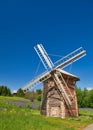 Wooden windmill under clear sky