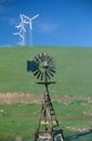 Wooden windmill and wind turbines, SD Royalty Free Stock Photo