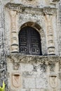 A wooden window of the Alcazar of Colon , Old City, Santo Domingo
