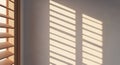Wooden window blinds create diagonal light Royalty Free Stock Photo