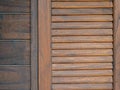 Wooden window with brown shutters background. Close-up pattern texture of traditional asian style wood work. Royalty Free Stock Photo