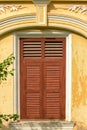 Wooden window of classic sino portuguese architecture in old town Phuket Thailand Royalty Free Stock Photo