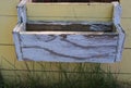 Wooden window flower box with old paint vintage distressed