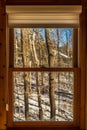 Wooden window in forest house with beautiful view Royalty Free Stock Photo