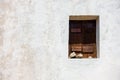 Wooden window on old white wall Royalty Free Stock Photo