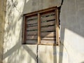 Wooden window of Raja Ravi Varma& x27;s ruined studio, Vadodara, Gujarat, India