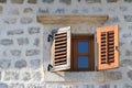 Wooden window with shutters close-up in an old house Royalty Free Stock Photo