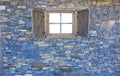 wooden window on stone wall