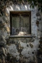Wooden window in a stone wall house with plaster covering some of the bricks in Suzhou China