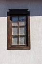 Wooden window on white wall of a building, home concept