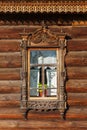 Wooden windows with frames, traditional old Russian architecture