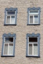 Wooden windows over an old building in Quebec Royalty Free Stock Photo