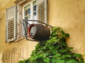 Wooden wine barrel affixed to the wall of a vinotheque in the town of Caldaro, South Tyrol Royalty Free Stock Photo